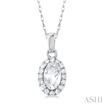 5x3 MM Oval Shape White Topaz and 1/20 Ctw Single Cut Diamond Halo Semi-Precious Pendant with Chain in 14K White Gold